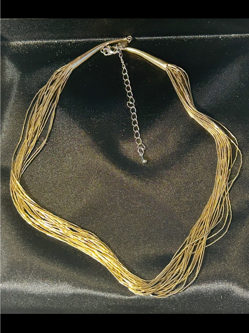Layered Multi-Strand Gold Necklace with Adjustable Chain